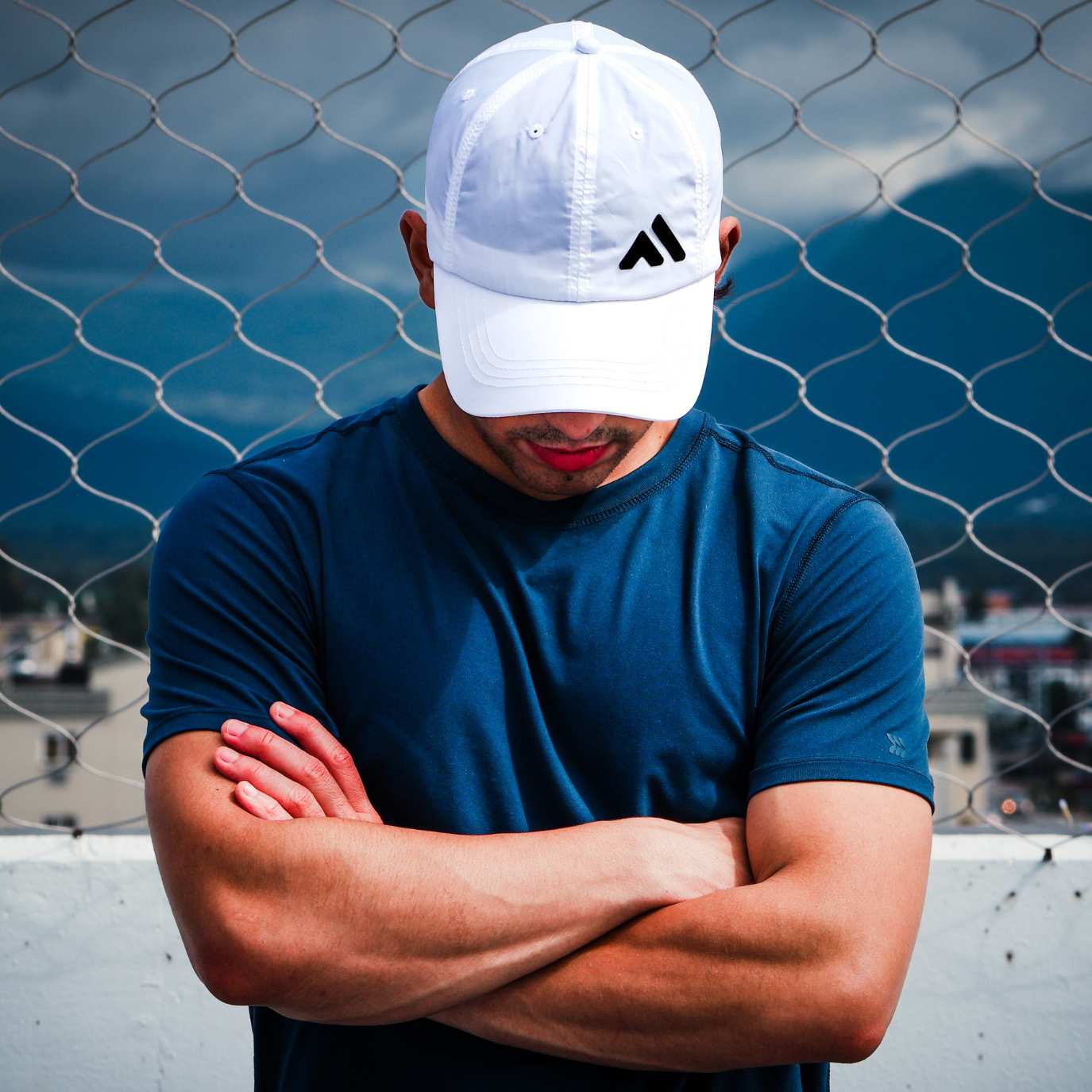 Man Wearing White Baseball Cap