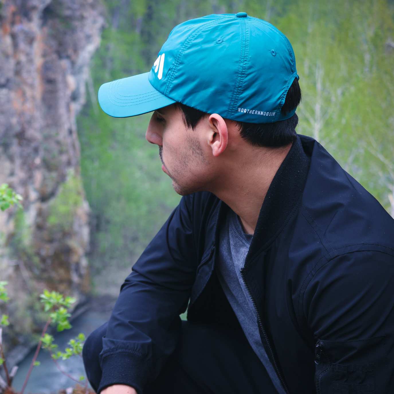 Man Wearing Turquoise Baseball Cap