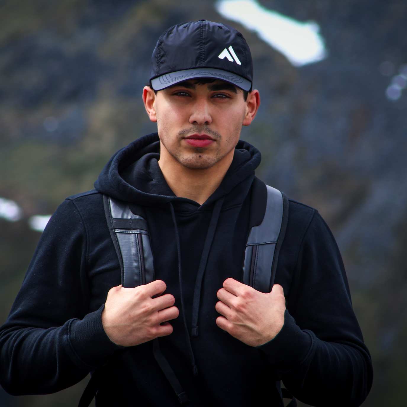 Man Wearing Black Baseball Cap 