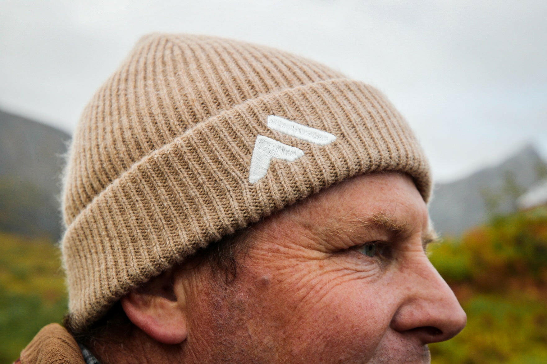 Man Wearing Tan Beanie