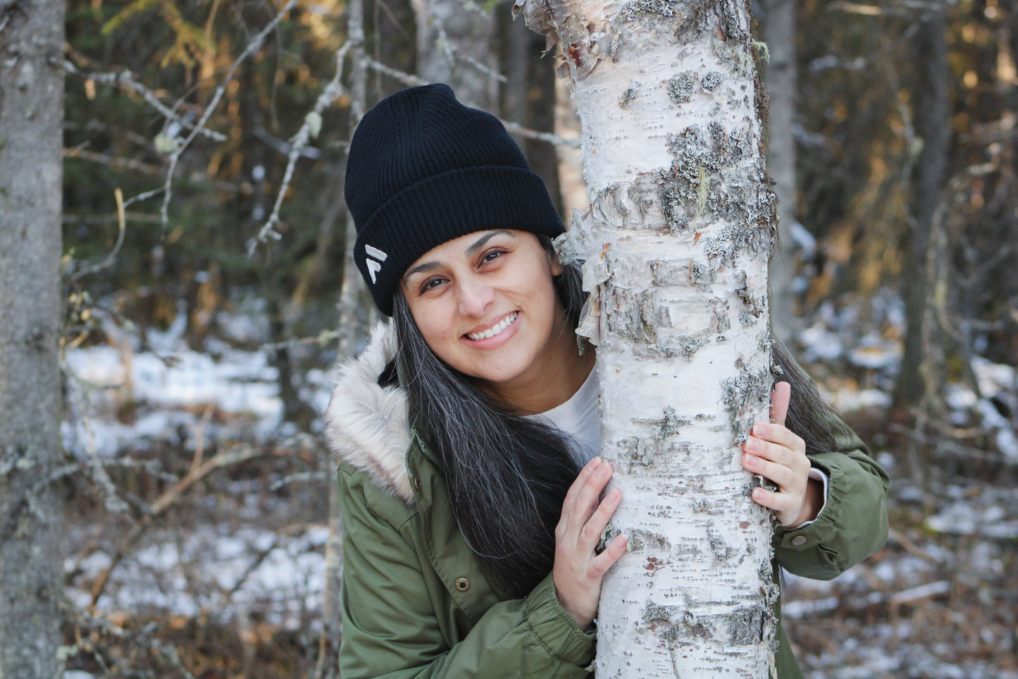 Woman Wearing A Coal Black Beanie